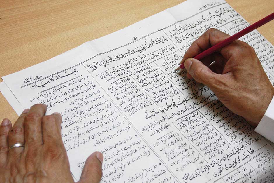 People on Arabian writing.