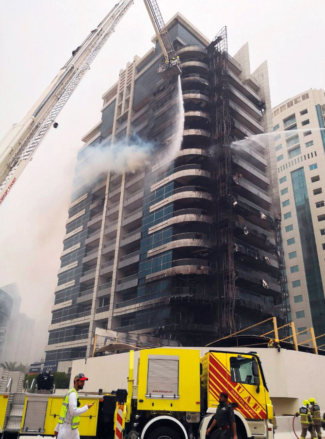 Residents escape Dubai tower fire